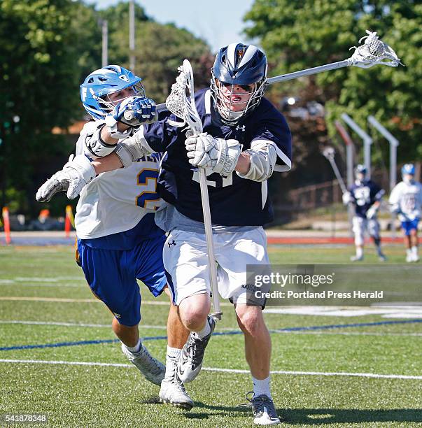 Falmouth Riley Reed puts the pressure on Yarmouth Matthew Beatty in the first half of the Class B lacrosse state championships at Fitzpatrick Stadium.