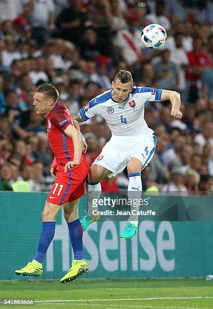 Jamie Vardy of England and Jan Durica of Slovakia in action during the UEFA EURO 2016 Group B match between Slovakia and England at Stade...