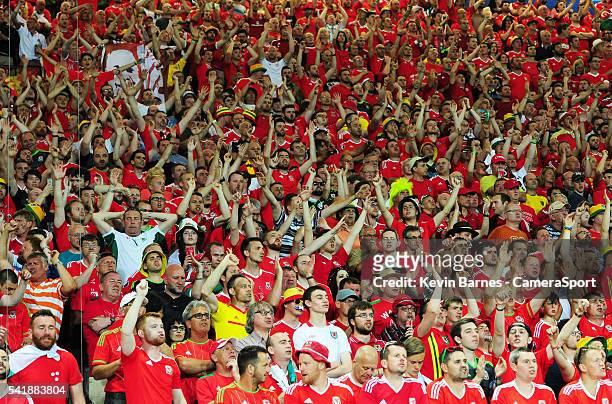 Wales fans watch the match during the UEFA Euro 2016 Group B match between Russia v Wales at Stadium de Toulouse on June 20 in Toulouse, France.