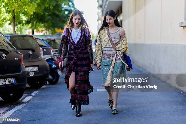 Gilda Ambrosio wearing a boho dress and Chiara Capitani outside Etro during the Milan Men's Fashion Week Spring/Summer 2017 on June 20, 2016 in...