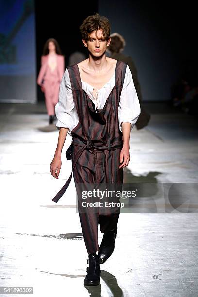 Model walks the runway at the Vivienne Westwood show during Milan Men's Fashion Week SS17 on June 19, 2016 in Milan, Italy.