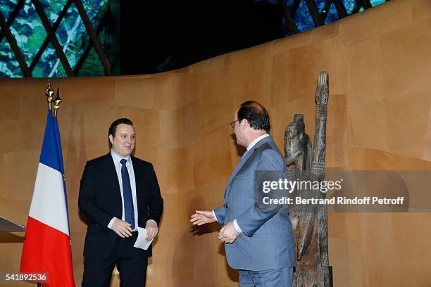 Martin Rey-Chirac and Francois Hollande attend the 'Jacques Chirac ou le Dialogue des Cultures' Exhibition during the 10th Anniversary of Quai Branly...