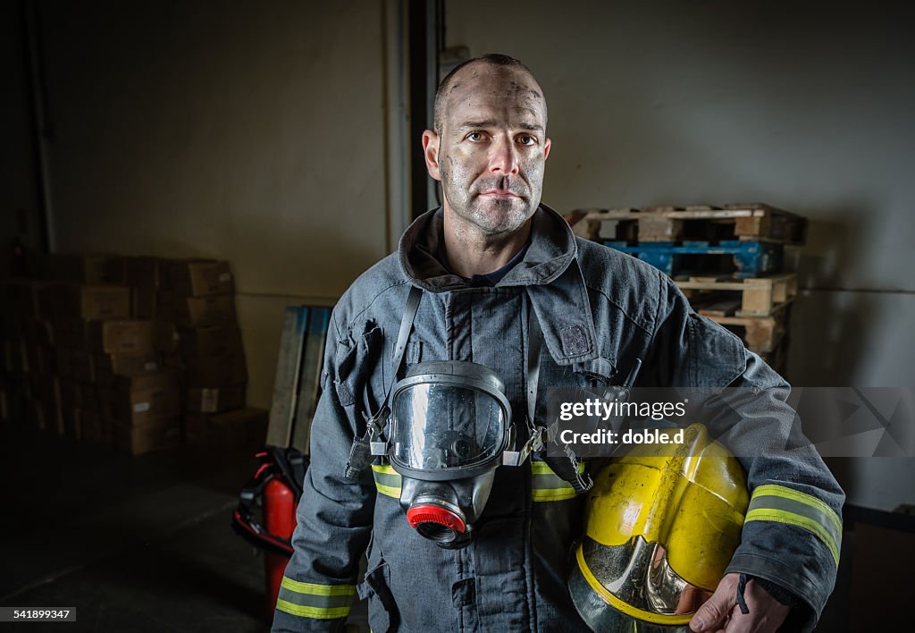 Tired firefighter after a emergency intervention