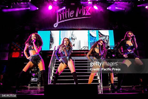 The girl pop band Little Mix members Perrie Edwards, Jesy Nelson, Leigh-Anne Pinnock, Jade Thirlwall pictured on stage as they perform live at Street...
