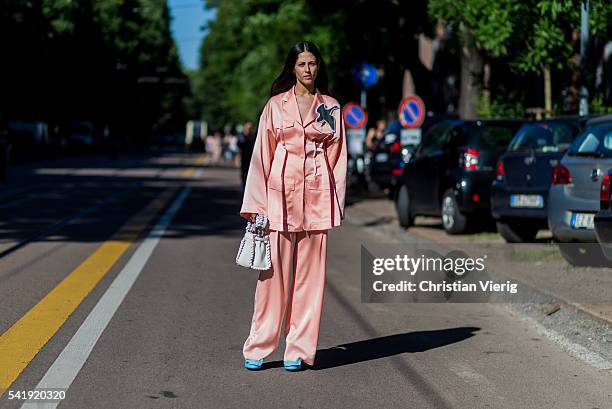 Gilda Ambrosio wearing a pink pyjama outside Fendi during the Milan Men's Fashion Week Spring/Summer 2017 on June 20, 2016 in Milan, Italy.