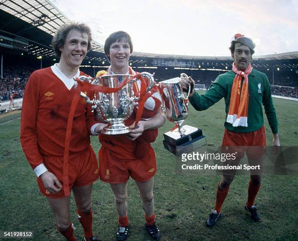 Liverpool players with the League Cup and the Milk Cup following their victory over Tottenham Hotspur in the League Cup Final, sponsored by the Milk...