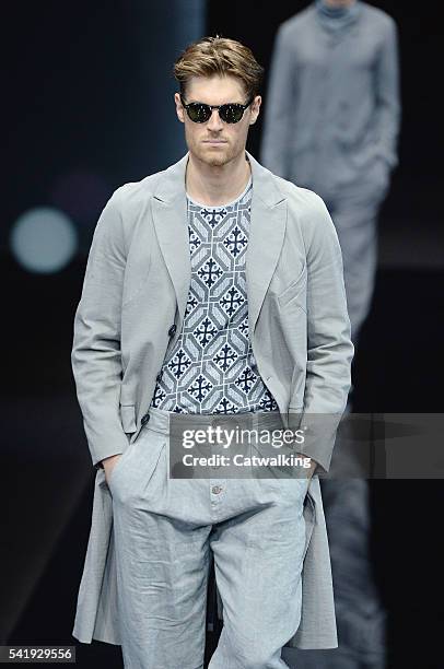 Model walks the runway at the Giorgio Armani Spring Summer 2017 fashion show during Milan Menswear Fashion Week on June 21, 2016 in Milan, Italy.