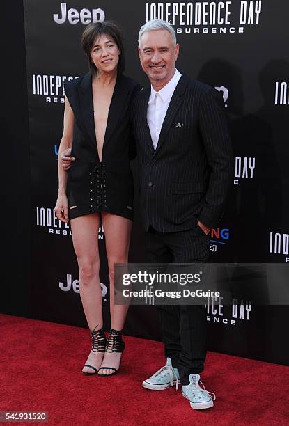 Actress/singer Charlotte Gainsbourg and director Roland Emmerich arrive at the premiere of 20th Century Fox's "Independence Day: Resurgence" at TCL...