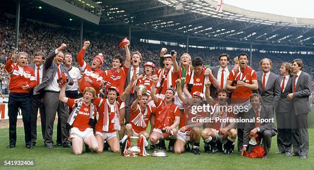 Manchester United celebrate with the trophy after the FA Cup Final between Manchester United and Everton at Wembley Stadium in London, 18th May 1985....