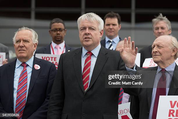 Former Leader of the Labour Party Neil Kinnock and Peter Hain listen as the First Minister of Wales, Carwyn Jones speaks as they attend a Remain call...