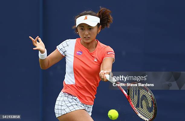 Misaki Doi of Japan plays a forehand during her second round women's singles match against Polona Herzog of Slovenia on day three of the WTA Aegon...