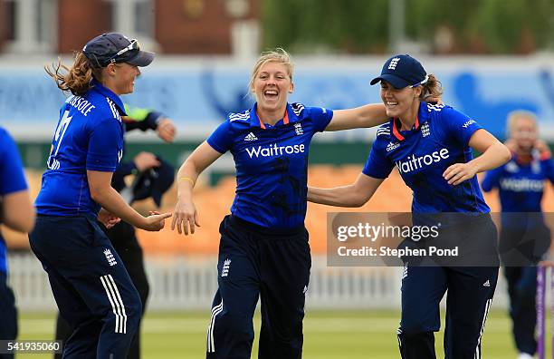 Heather Knight of England and team mates celebrate after bowling out Pakistan for 165 during the 1st Royal London ODI match between England Women and...