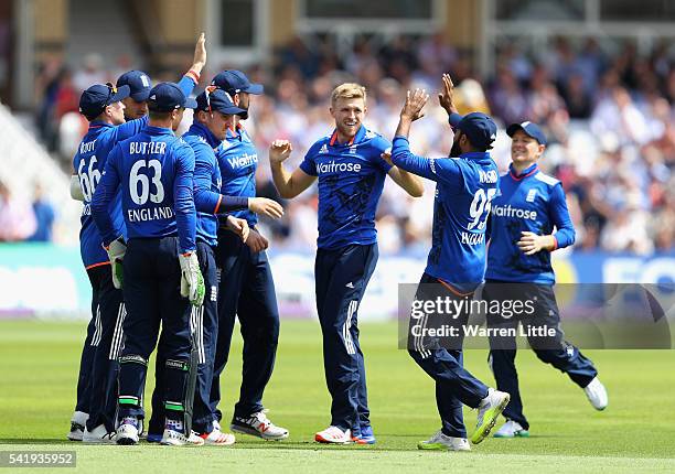 David Willey of England celebrates the wicket of Kusal Perera of Sri Lanka caught by Jaosn Roy of England during of the 1st ODI Royal London One Day...