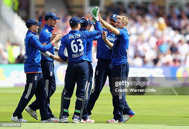 David Willey of England celebrates the wicket of Kusal Perera of Sri Lanka caught by Jaosn Roy of England during of the 1st ODI Royal London One Day...