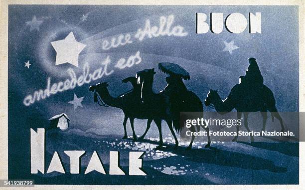'Ecce stella antecedebat eos': The star guides the Magi traveling on camels in the desert. Postcard greeting lithographic, monochrome blue night,...