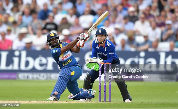 Seekkuge Prasanna of Sri Lanka hits out for six runs during the 1st ODI Royal London One Day match between England and Sri Lanka at Trent Bridge on...