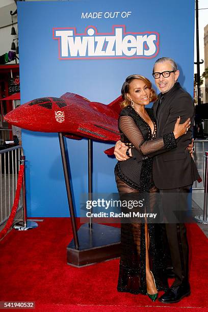 Take a bite out of this: Vivica A. Fox and Jeff Goldblum, co-stars of Fox's Independence Day: Resurgence, unveil a replica of the film's Hybrid...