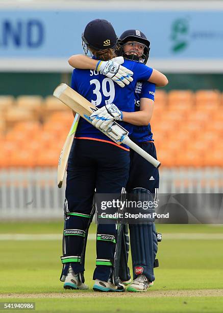 Heather Knight and Natalie Sciver of England celebrate victory after the 1st Royal London ODI match between England Women and Pakistan Women at Grace...