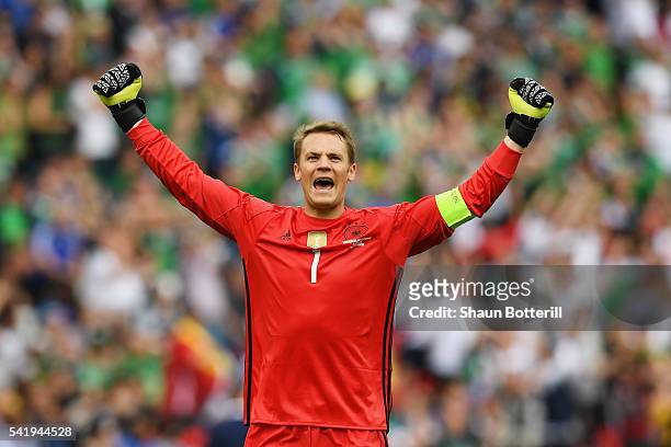 Manuel Neuer of Germany celebrates his team's first goal during the UEFA EURO 2016 Group C match between Northern Ireland and Germany at Parc des...