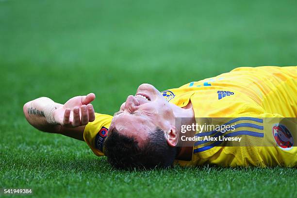 Artem Fedetskiy of Ukraine lies on the floor injured during the UEFA EURO 2016 Group C match between Ukraine and Poland at Stade Velodrome on June...