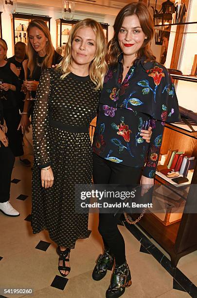 Sienna Miller and Amber Anderson attend the launch of Wendy Rowe's new book 'Eat Beautiful' hosted by Sienna Miller at Burberry's all day cafe...