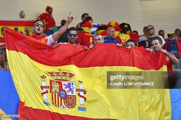 Spain supporters wave the national flag during the Euro 2016 group D football match between Croatia and Spain at at the Matmut Atlantique stadium in...