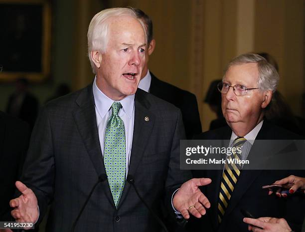 Sen. John Cornyn , , and Senate Majority Leader Mitch McConnell , speak to reporters after their weekly policy luncheon on Capitol Hill, June 21,...