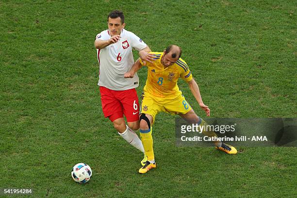 Tomasz Jodlowiec of Poland and Roman Zozulya of Ukraine during the UEFA EURO 2016 Group C match between Ukraine and Poland at Stade Velodrome on June...