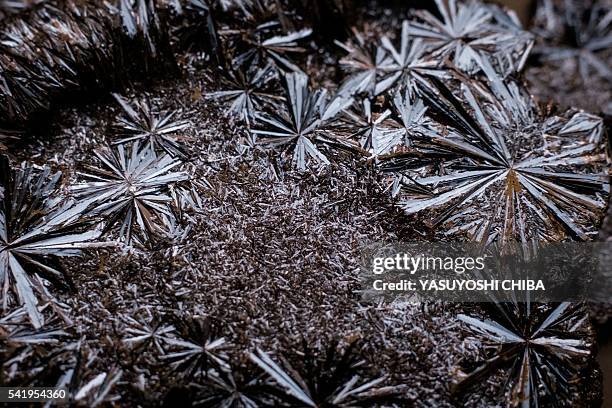 Vanadium cristal is seen on a surface of fused flake product at Canadian based Strategic Mineral Company Largo Resources' Vanadium plant, near...