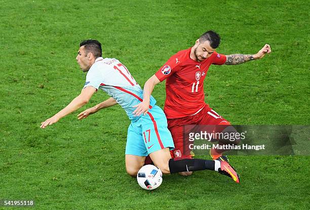 Burak Yilmaz of Turkey is tackled by Daniel Pudil of Czech Republic during the UEFA EURO 2016 Group D match between Czech Republic and Turkey at...