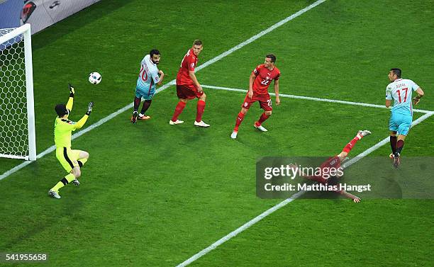 Burak Yilmaz of Turkey scores his team's first goal during the UEFA EURO 2016 Group D match between Czech Republic and Turkey at Stade...
