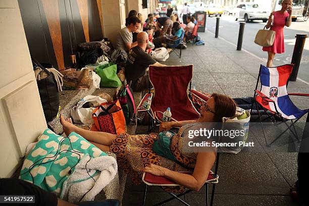Theresa Cardamone waits with dozens of others, many who have been there for days, for tickets for the popular Broadway show Hamilton on June 21, 2016...