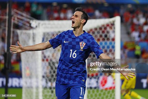 Nikola Kalinic of Croatia celebrates scoring his team's first goal during the UEFA EURO 2016 Group D match between Croatia and Spain at Stade Matmut...