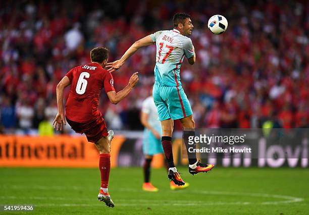 Tomas Sivok of Czech Republic tackles Burak Yilmaz of Turkey during the UEFA EURO 2016 Group D match between Czech Republic and Turkey at Stade...