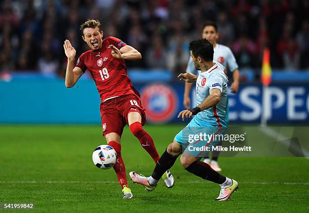 Ladislav Krejci of Czech Republic is tackled by Gokhan Gonul of Turkey during the UEFA EURO 2016 Group D match between Czech Republic and Turkey at...