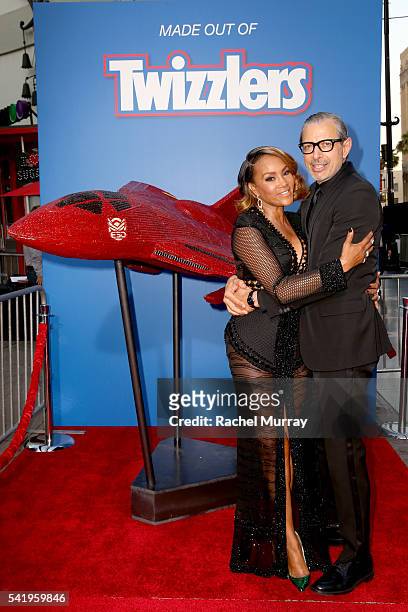 Take a bite out of this: Vivica A. Fox and Jeff Goldblum, co-stars of Fox's Independence Day: Resurgence, unveil a replica of the film's Hybrid...