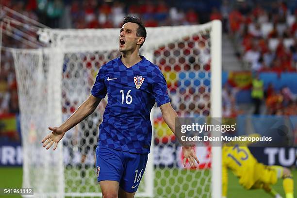 Nikola Kalinic of Croatia celebrates scoring his team's first goal during the UEFA EURO 2016 Group D match between Croatia and Spain at Stade Matmut...