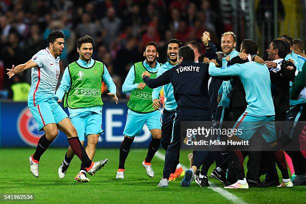 Ozan Tufan of Turkey celebrates scoring his team's second goal during the UEFA EURO 2016 Group D match between Czech Republic and Turkey at Stade...