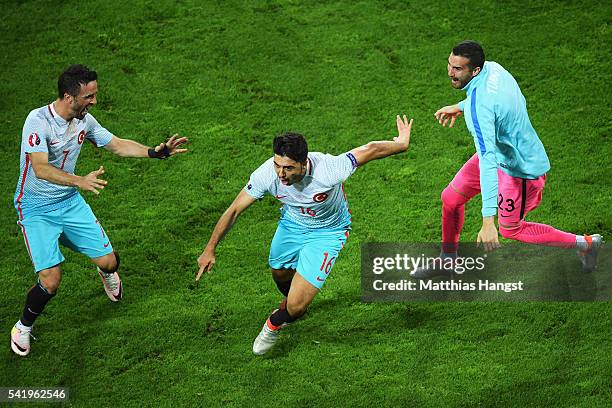 Ozan Tufan of Turkey celebrates scoring his team's second goal during the UEFA EURO 2016 Group D match between Czech Republic and Turkey at Stade...