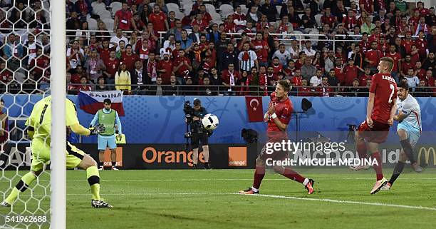 Turkey's midfielder Ozan Tufan scores a goal during the Euro 2016 group D football match between Czech Republic and Turkey at Bollaert-Delelis...