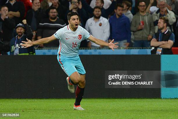 Turkey's midfielder Ozan Tufan celebrates after scoring a goal during the Euro 2016 group D football match between Czech Republic and Turkey at...
