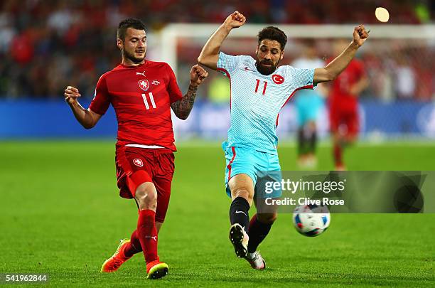 Daniel Pudil of Czech Republic tackles Olcay Sahan of Turkey during the UEFA EURO 2016 Group D match between Czech Republic and Turkey at Stade...