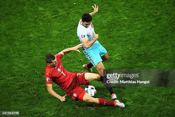 Ozan Tufan of Turkey and Tomas Necid of Czech Republic compete for the ball during the UEFA EURO 2016 Group D match between Czech Republic and Turkey...