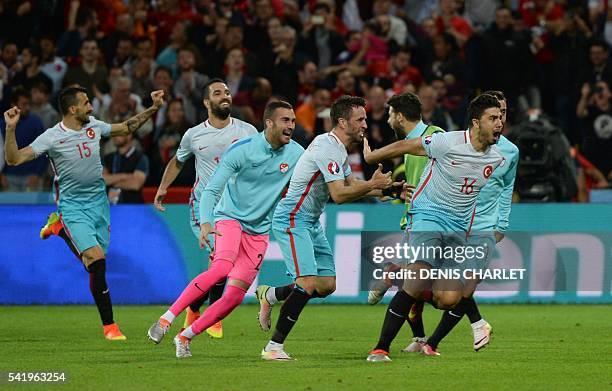 Turkey's midfielder Ozan Tufan celebrates after scoring a goal during the Euro 2016 group D football match between Czech Republic and Turkey at...