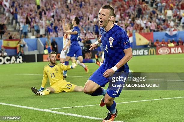 Croatia's midfielder Ivan Perisic celebrates his goal during the Euro 2016 group D football match between Croatia and Spain at the Matmut Atlantique...