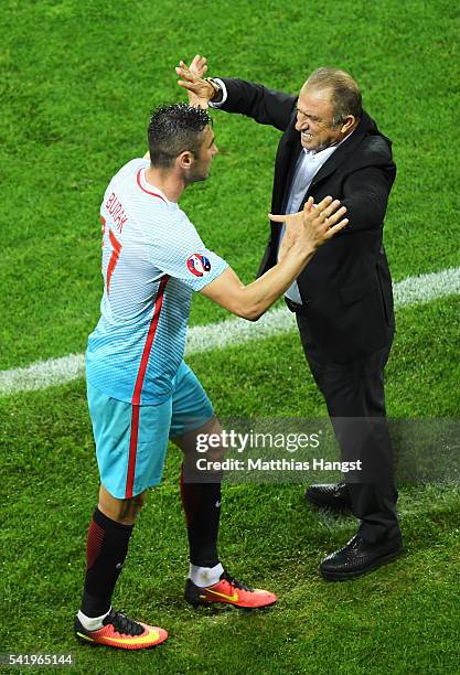 Burak Yilmaz of Turkey and Fatih Terim head coach of Turkey celebrate after during the UEFA EURO 2016 Group D match between Czech Republic and Turkey...