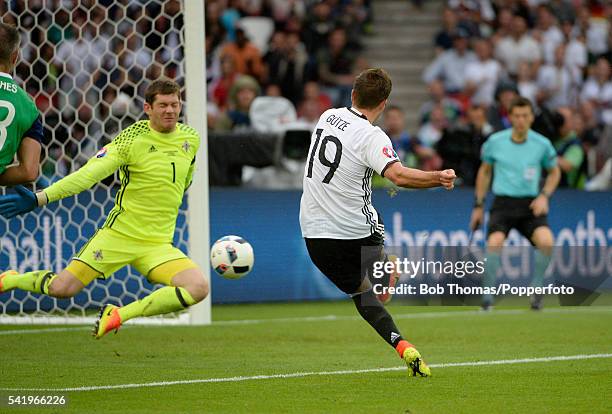 Mario Gotze of Germany has his shot saved by goalkeeper Michael McGovern of Northern Ireland during the UEFA EURO 2016 Group C match between Northern...