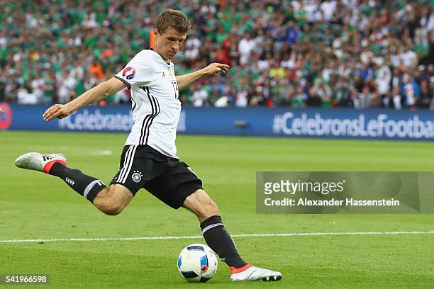 Thomas Mueller of Germany runs with the ball during the UEFA EURO 2016 Group C match between Northern Ireland and Germany at Parc des Princes on June...