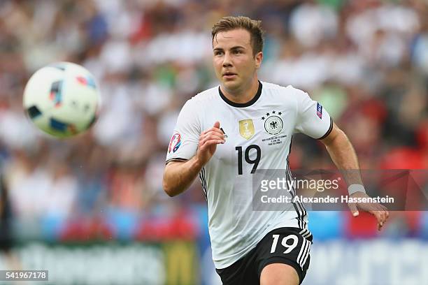 Mario Goetze of Germany runs with the ball during the UEFA EURO 2016 Group C match between Northern Ireland and Germany at Parc des Princes on June...