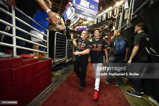Cleveland Cavaliers owner Dan Gilbert leaves the court after the game against the Golden State Warriors during Game Six of the 2016 NBA Finals on...